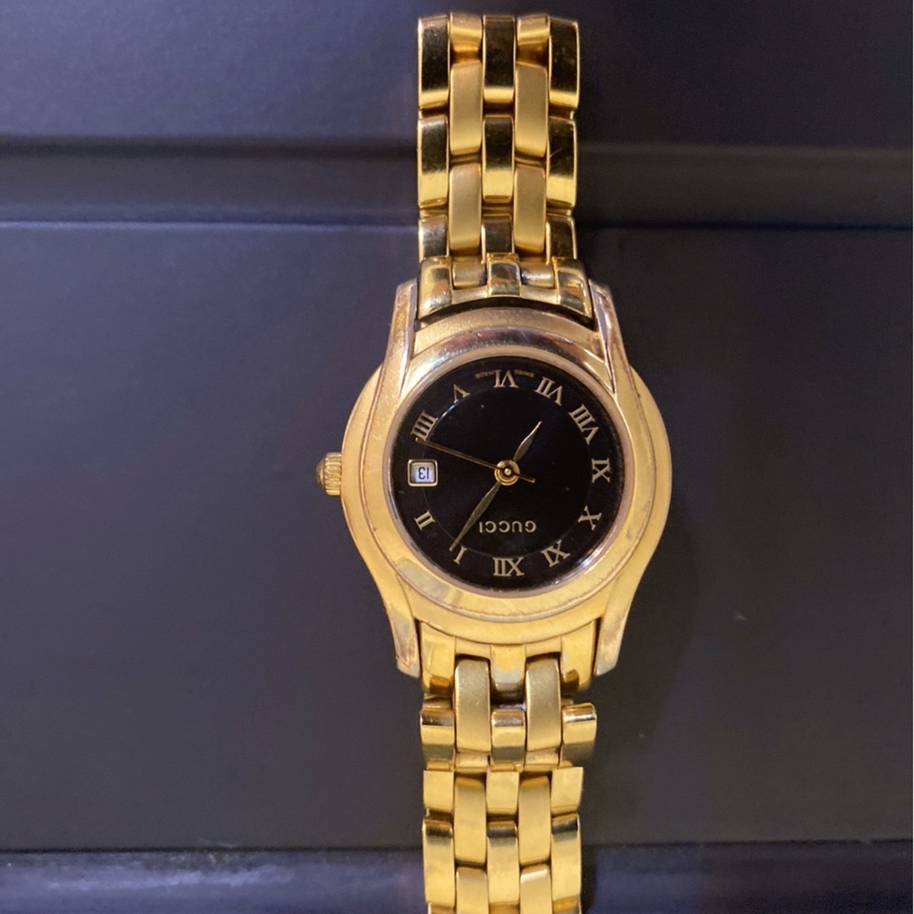 Gucci Gold Dress Watch with Intricate Metal Link Bracelet